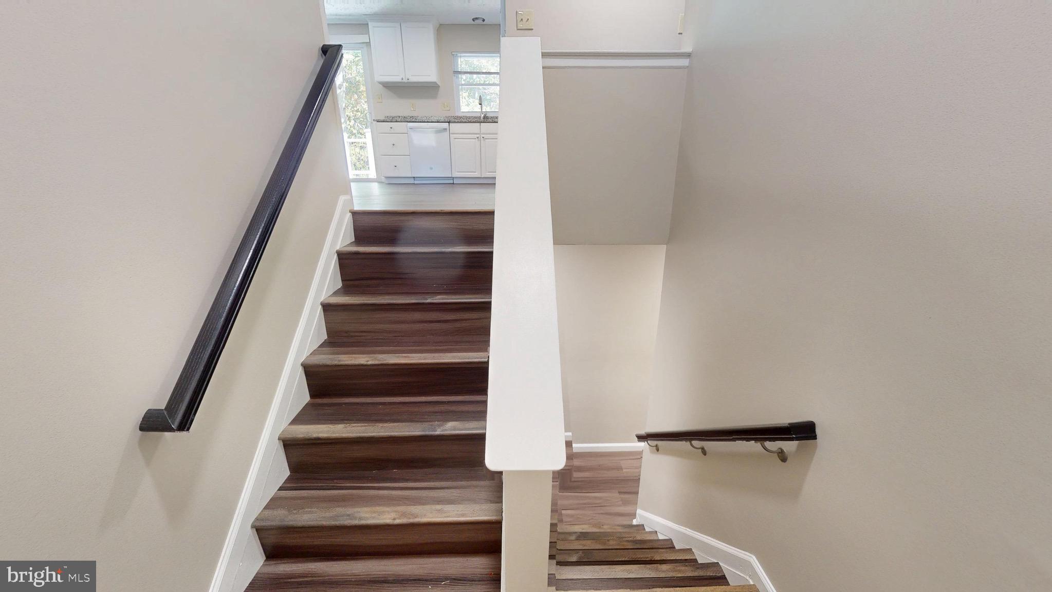 12820 Twin Oak Drive Waldorf, MD 20601 - Photo 6 of 98 a view of entryway and gallery with wooden floor