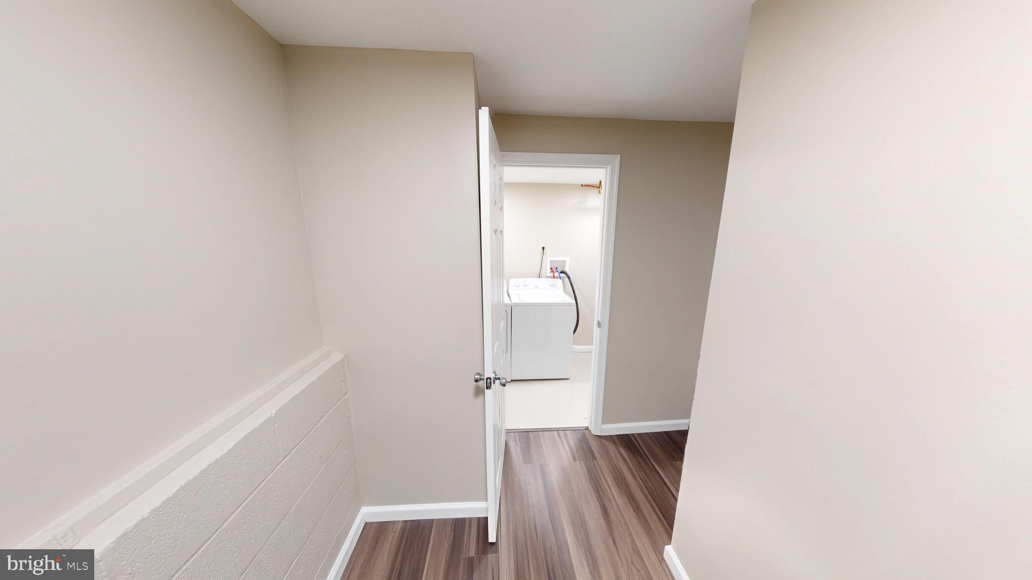 12820 Twin Oak Drive Waldorf, MD 20601 - Photo 68 of 98 a view of hallway with wooden floor