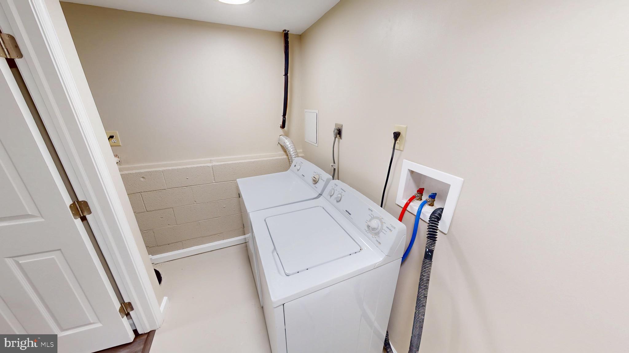 12820 Twin Oak Drive Waldorf, MD 20601 - Photo 72 of 98 a utility room with dryer and washer