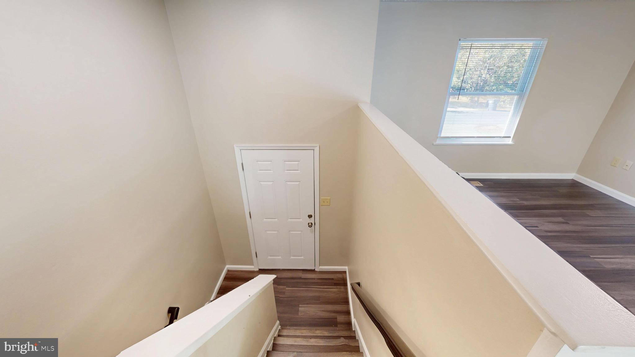 12820 Twin Oak Drive Waldorf, MD 20601 - Photo 9 of 98 a view of a hallway with windows