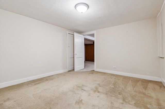 an empty room with an entryway