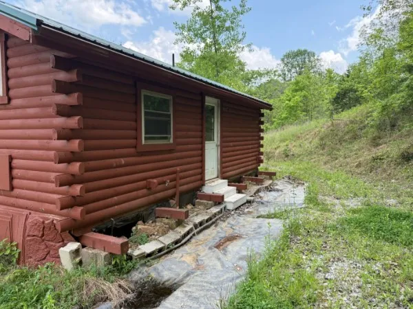 a backyard of a house with lots of green space