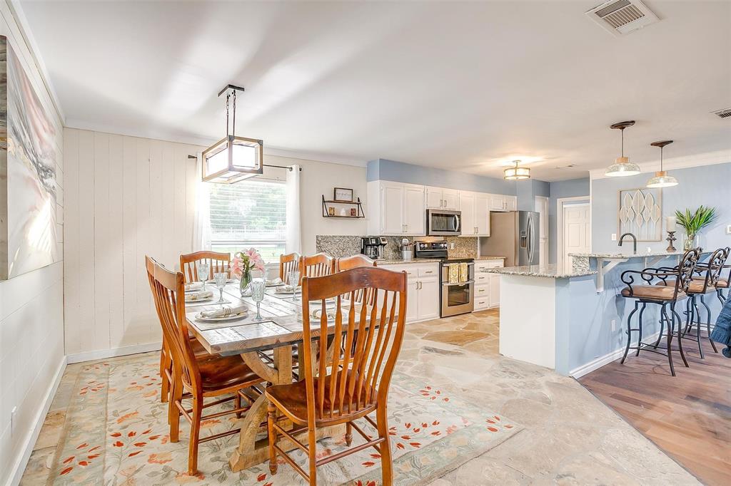 520 Deer Trail Gordon, TX 76453 - Photo 6 of 40 Dining space with ornamental molding and light stone finish flooring