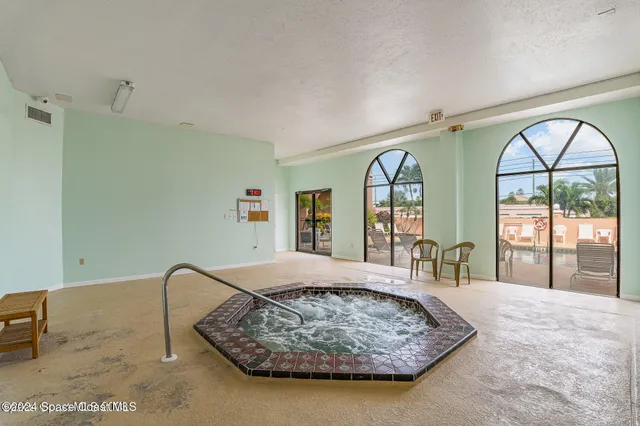 a view of a livingroom with furniture and window