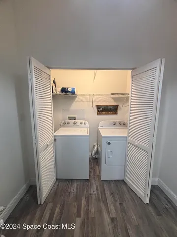 a utility room with washer and dryer