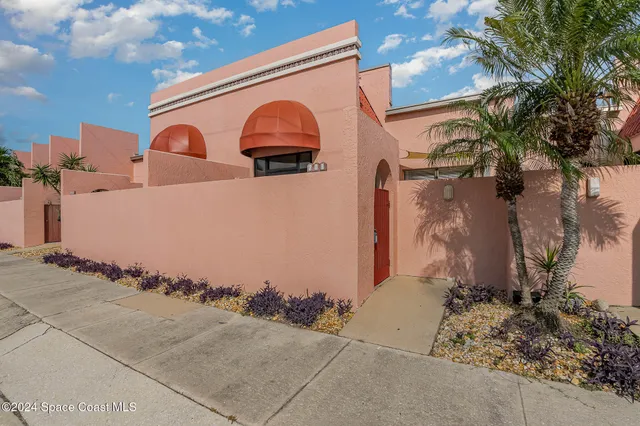 a view of a back yard of the house
