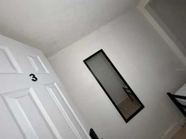 a view of entryway with stairs