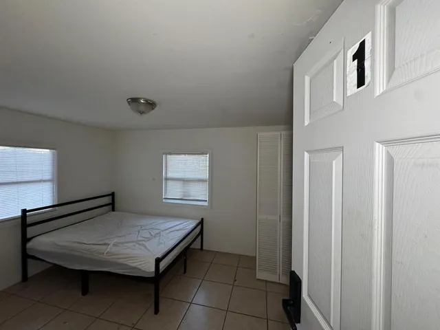 a room with a table and window