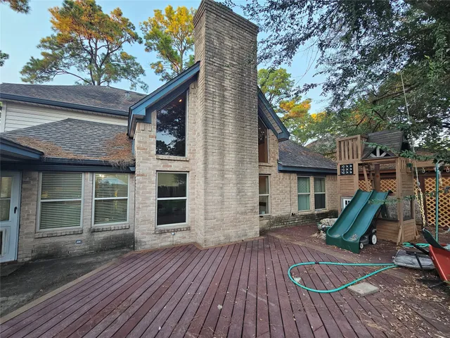 a view of outdoor space yard deck and slide