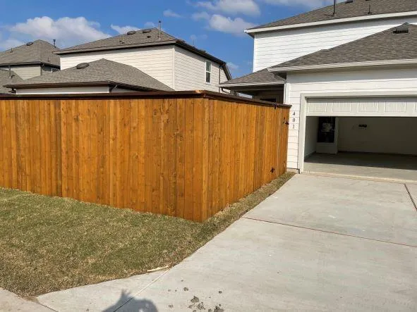 a view of garage with a sink and dishwasher