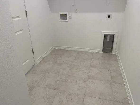 a view of gallery with wooden floor