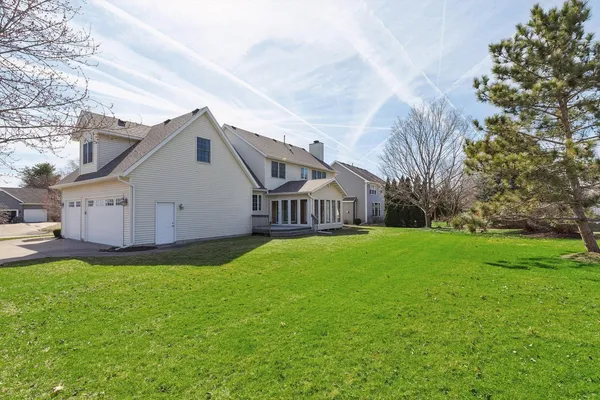 a view of a house with a back yard