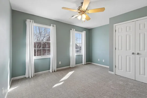 a view of a kitchen with a sink and a window