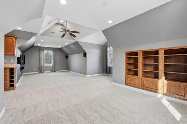 a view of kitchen with furniture and wooden floor