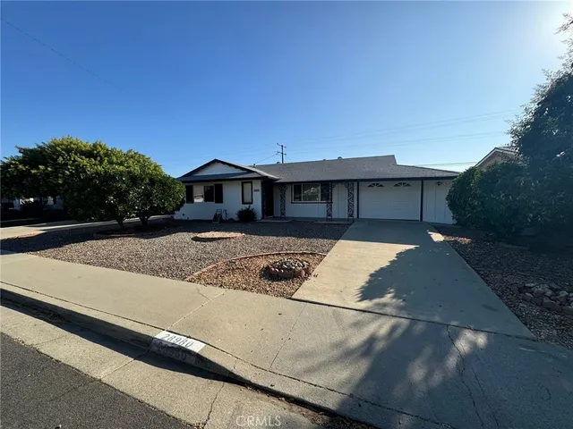a view of a house with a roof deck