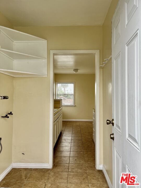 4424 1/2 Arlington Avenue Los Angeles, CA 90043 - Photo 6 of 10 a bathroom with a tub and shower