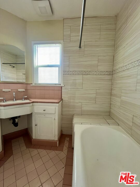 4424 1/2 Arlington Avenue Los Angeles, CA 90043 - Photo 10 of 10 a bathroom with a sink and a toilet
