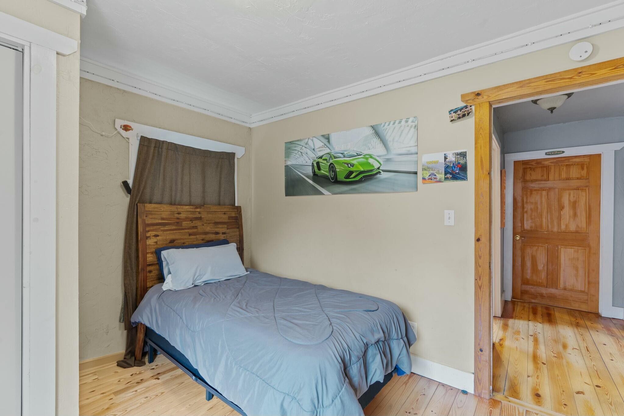 362 Carson Road Southeast Cleveland, TN 37323 - Photo 17 of 24 a bedroom with a bed and a painting on the wall