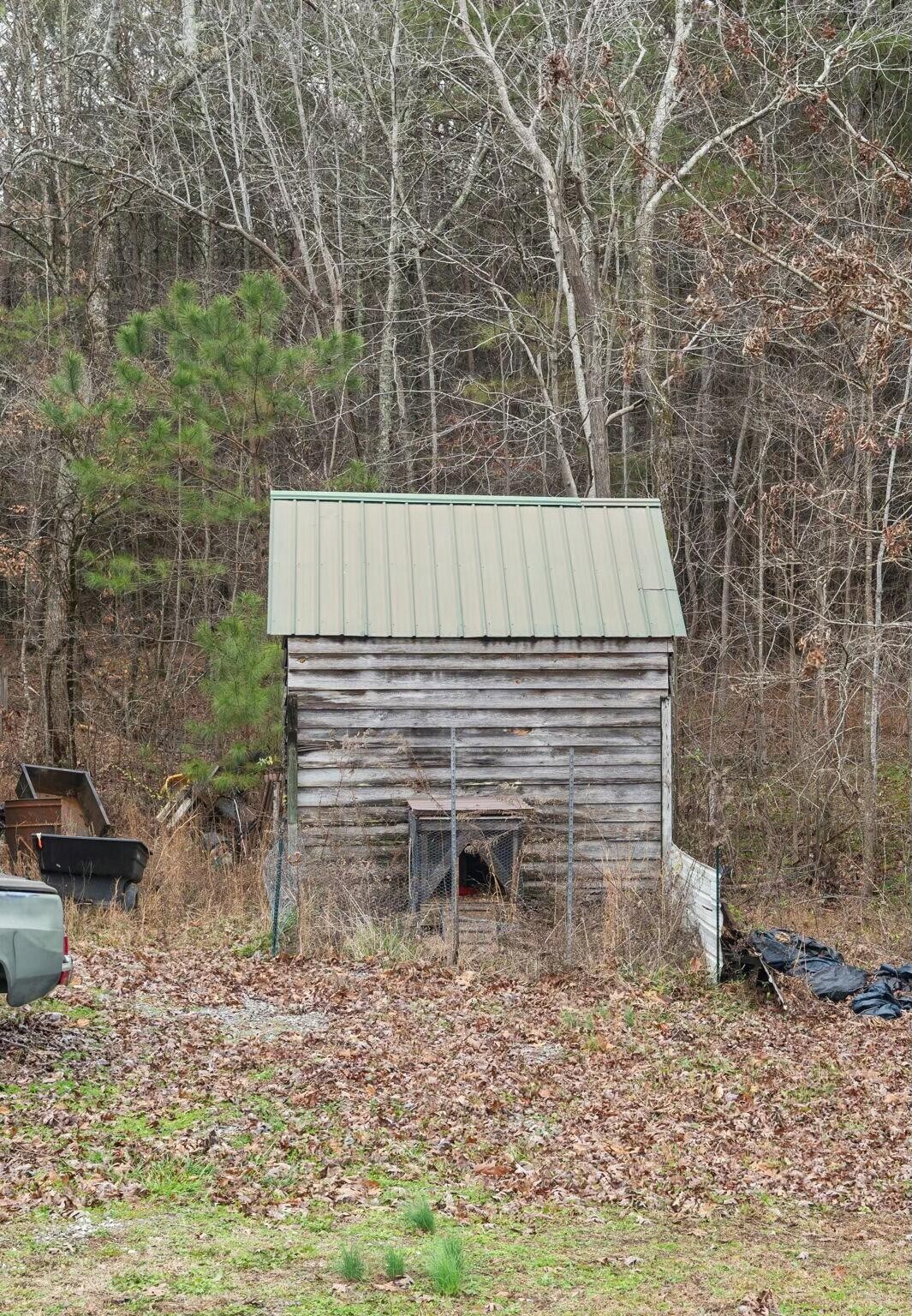362 Carson Road Southeast Cleveland, TN 37323 - Photo 23 of 24 a view of a backyard with plants and large trees