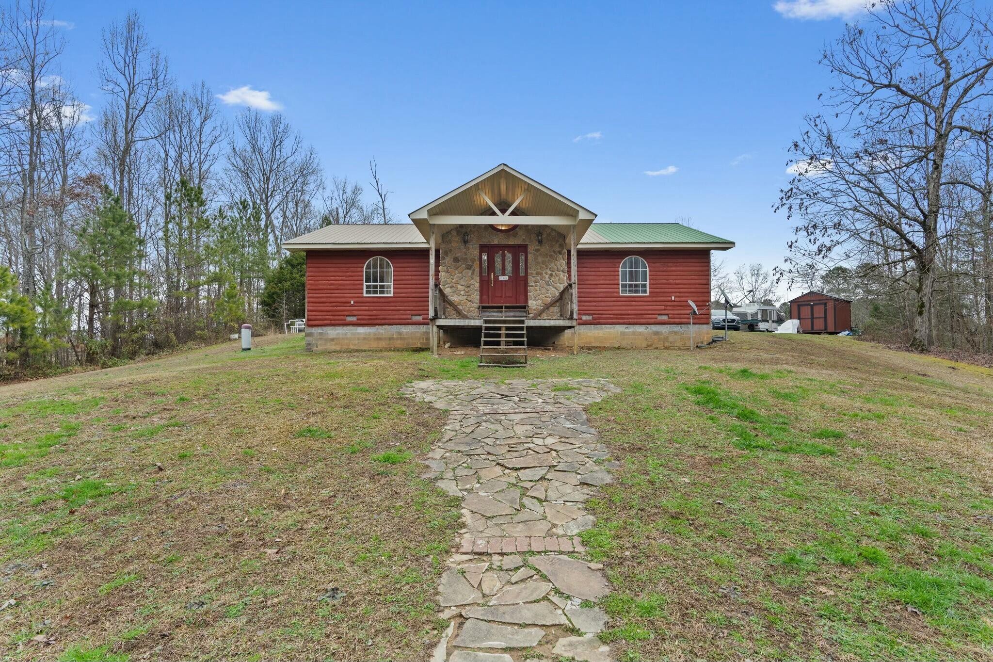 362 Carson Road Southeast Cleveland, TN 37323 - Photo 4 of 24 a house with trees in the background