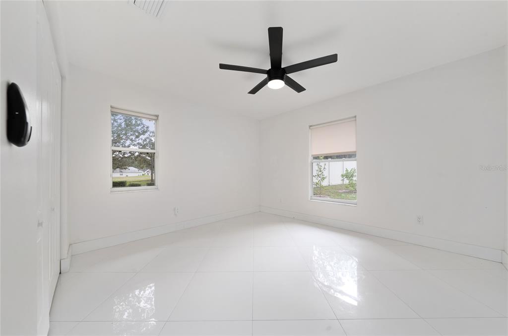 11036 Bronson Road Clermont, FL 34711 - Photo 16 of 29 a view of a window in an empty room