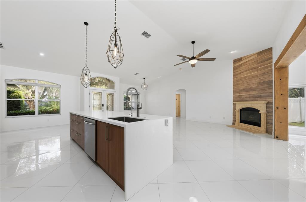 11036 Bronson Road Clermont, FL 34711 - Photo 7 of 29 a kitchen with cabinets and window