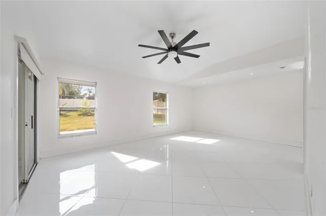 a view of an empty room and window