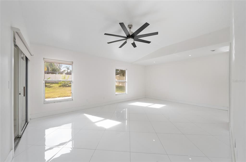 11036 Bronson Road Clermont, FL 34711 - Photo 9 of 29 a view of an empty room and window