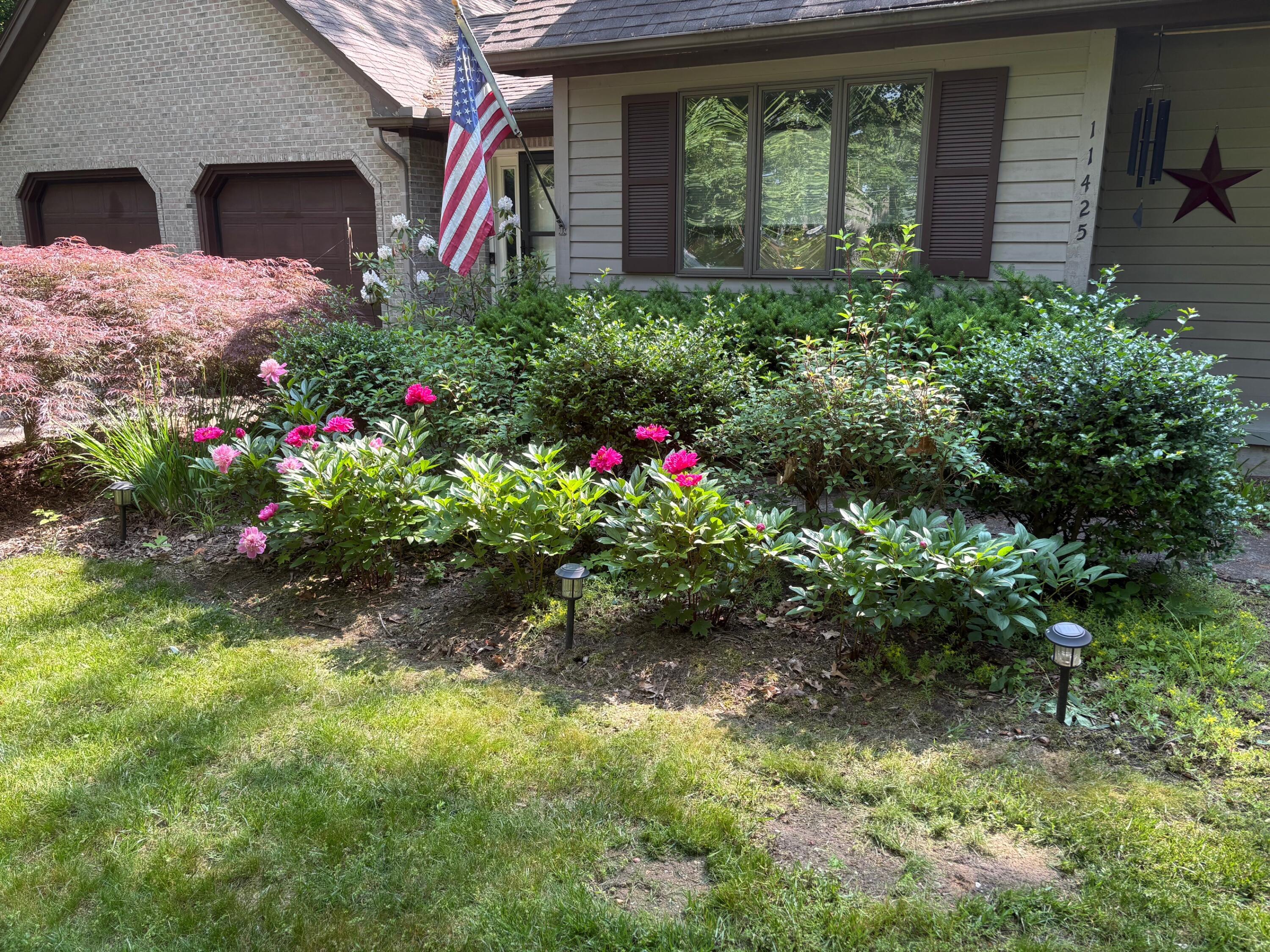 11425 Mcgregor Road Pinckney, MI 48169 - Photo 43 of 50 Front of House in Bloom 2