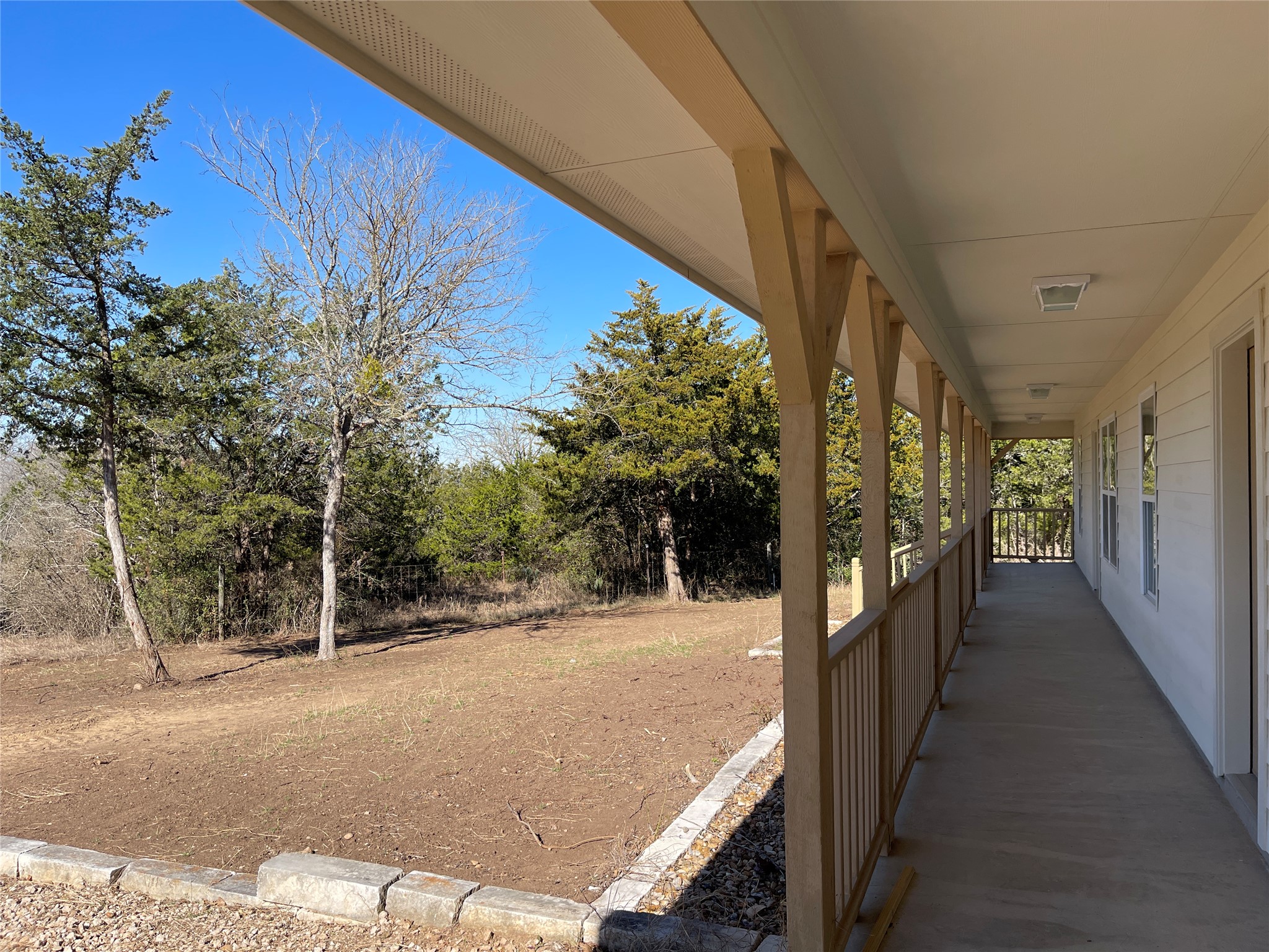 6164 South Fm 535 Road Cedar Creek, TX 78612 - Photo 2 of 27 a view of a pathway with a wrought fence