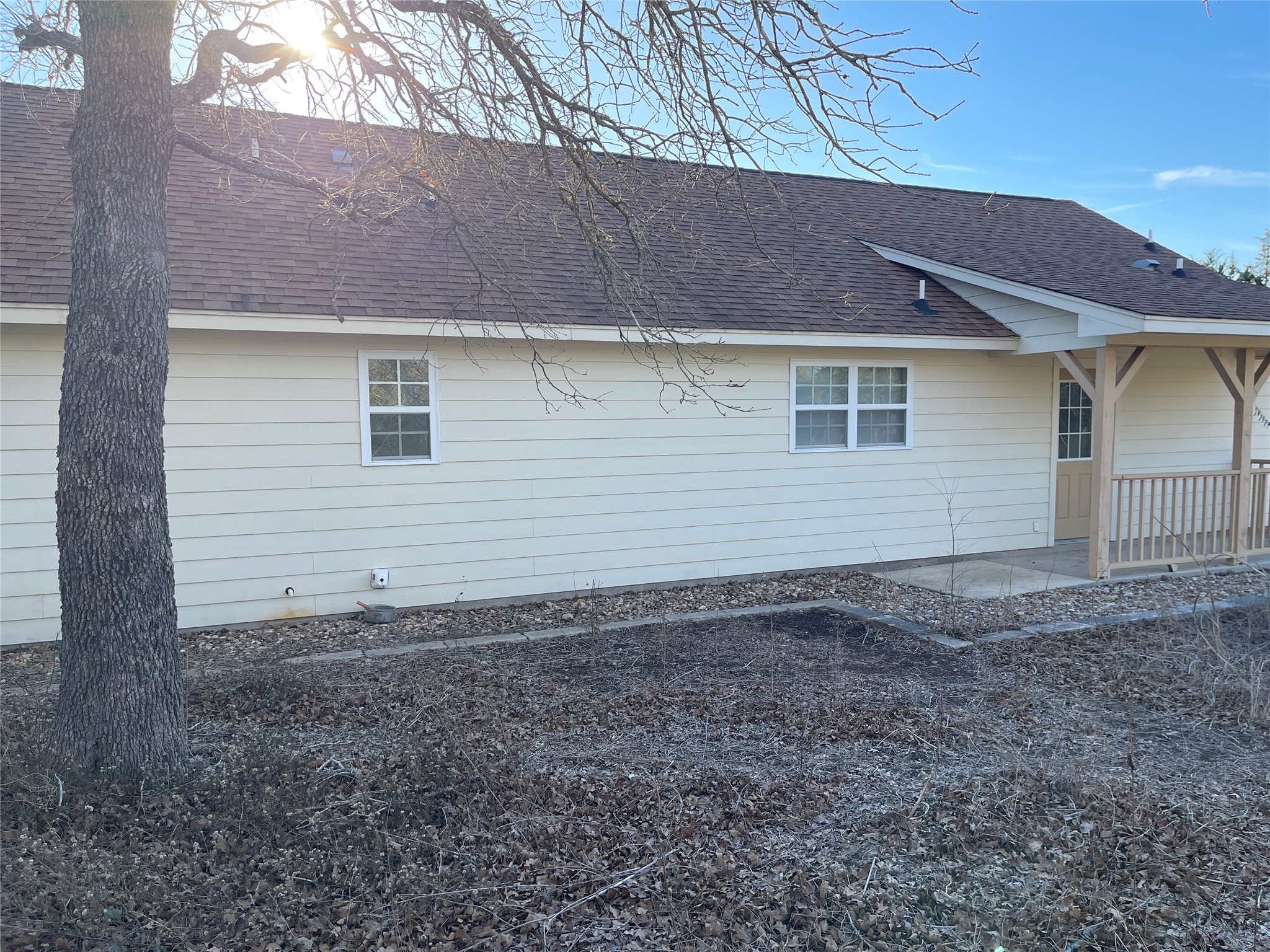 6164 South Fm 535 Road Cedar Creek, TX 78612 - Photo 5 of 27 a view of a house with a yard