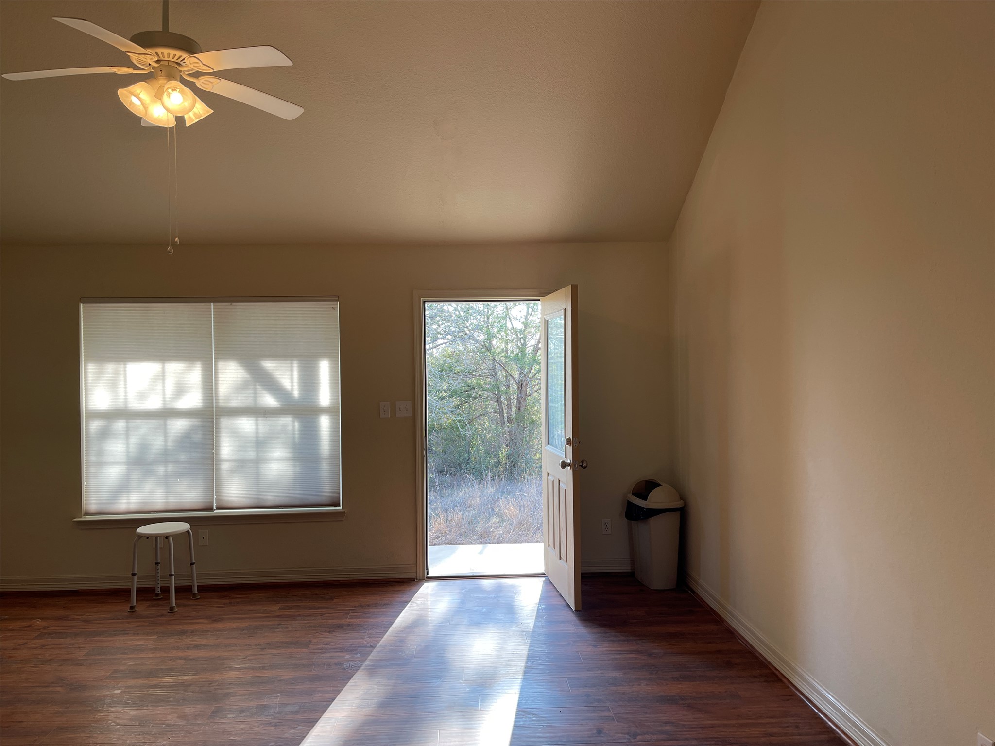 6164 South Fm 535 Road Cedar Creek, TX 78612 - Photo 9 of 27 wooden floor in an empty room with a window