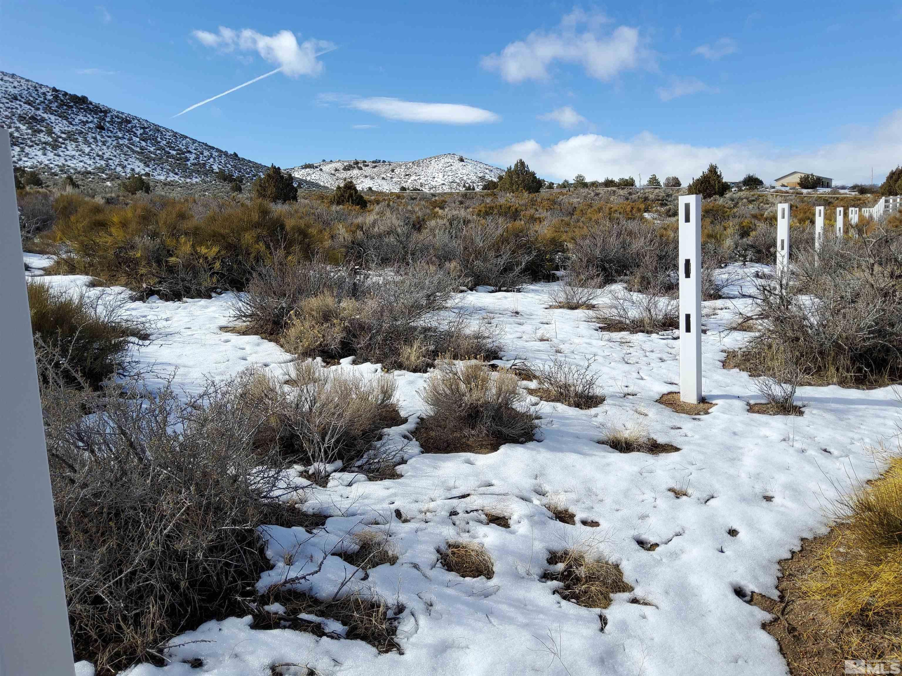 Undisclosed Address Reno, NV 89510 - Photo 2 of 3 a view of a yard covered with snow