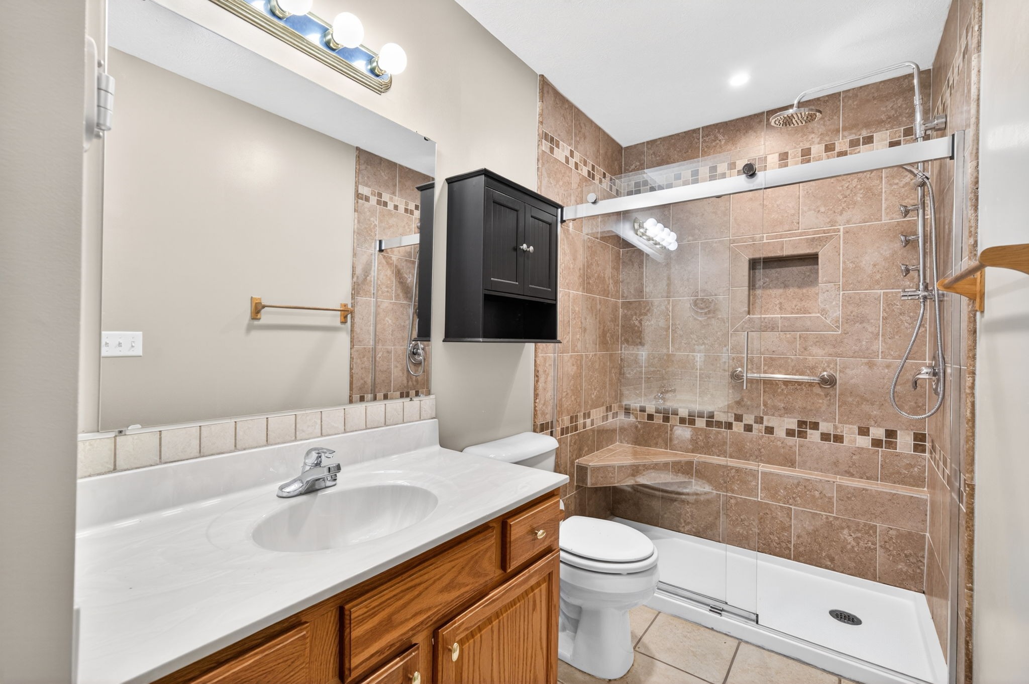 291 Poplar Point Lane Rickman, TN 38580 - Photo 18 of 41 a bathroom with a sink a toilet and shower