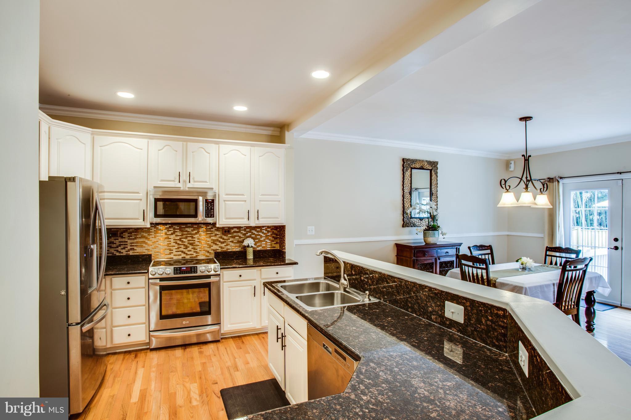 3857 Graham Park Road Triangle, VA 22172 - Photo 6 of 29 Granite Counters & Stainless Appliances