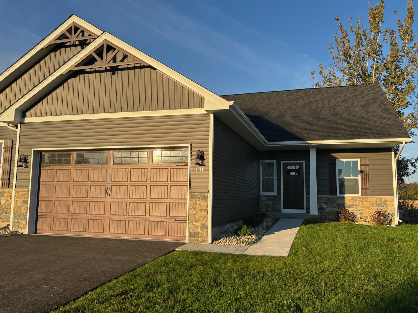 634 Anjali Court, Unit R Sycamore, IL 60178 - Photo 1 of 20 a view of a house with a yard