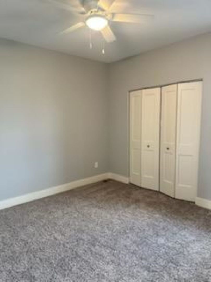 634 Anjali Court, Unit R Sycamore, IL 60178 - Photo 7 of 20 an empty room with an entryway door