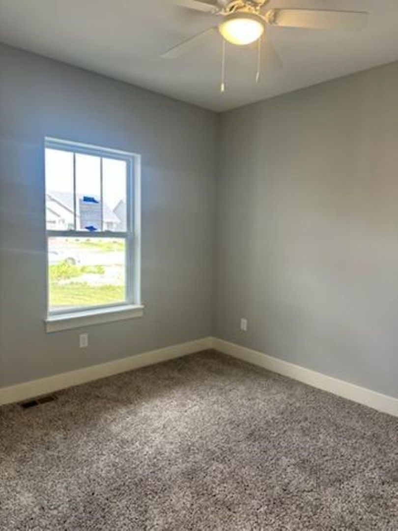 634 Anjali Court, Unit R Sycamore, IL 60178 - Photo 8 of 20 an empty room with a window