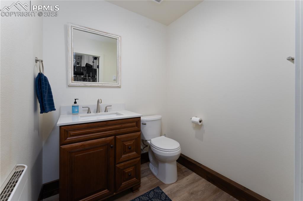 9775 Walker Road Colorado Springs, CO 80908 - Photo 21 of 50 a bathroom with a sink and a mirror