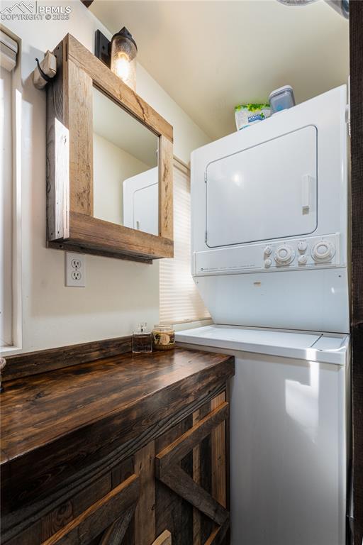 9775 Walker Road Colorado Springs, CO 80908 - Photo 36 of 50 a view of a microwave and cabinets