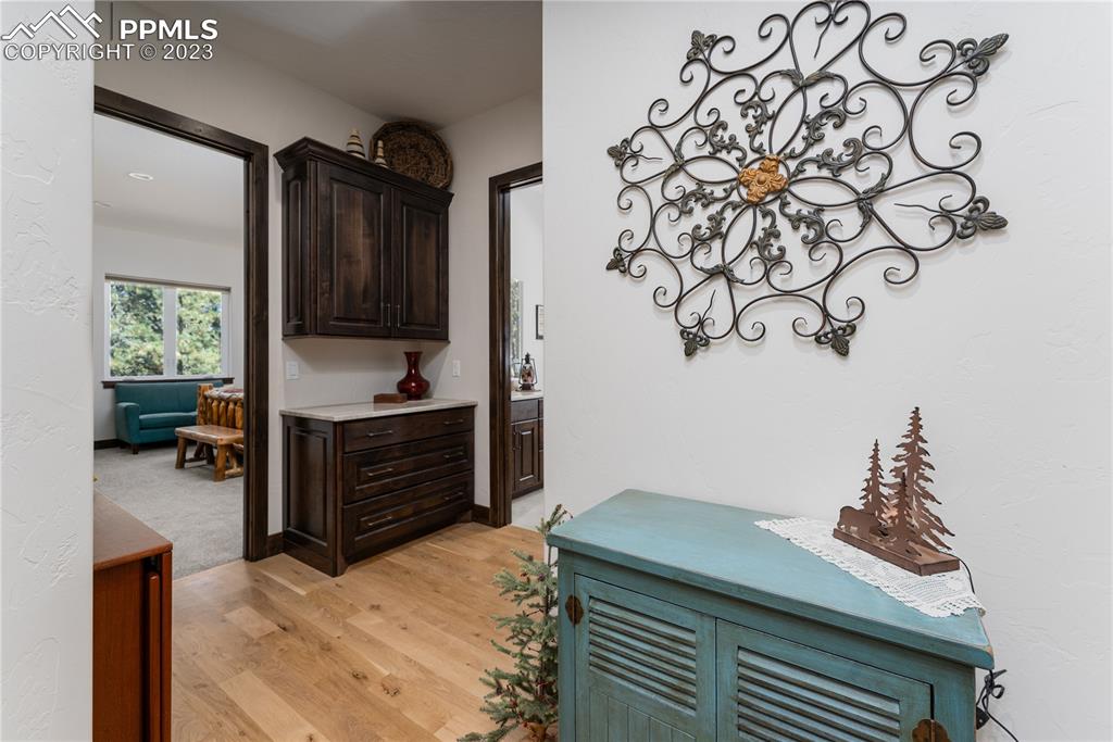 9775 Walker Road Colorado Springs, CO 80908 - Photo 10 of 50 a bedroom with a bed and a television