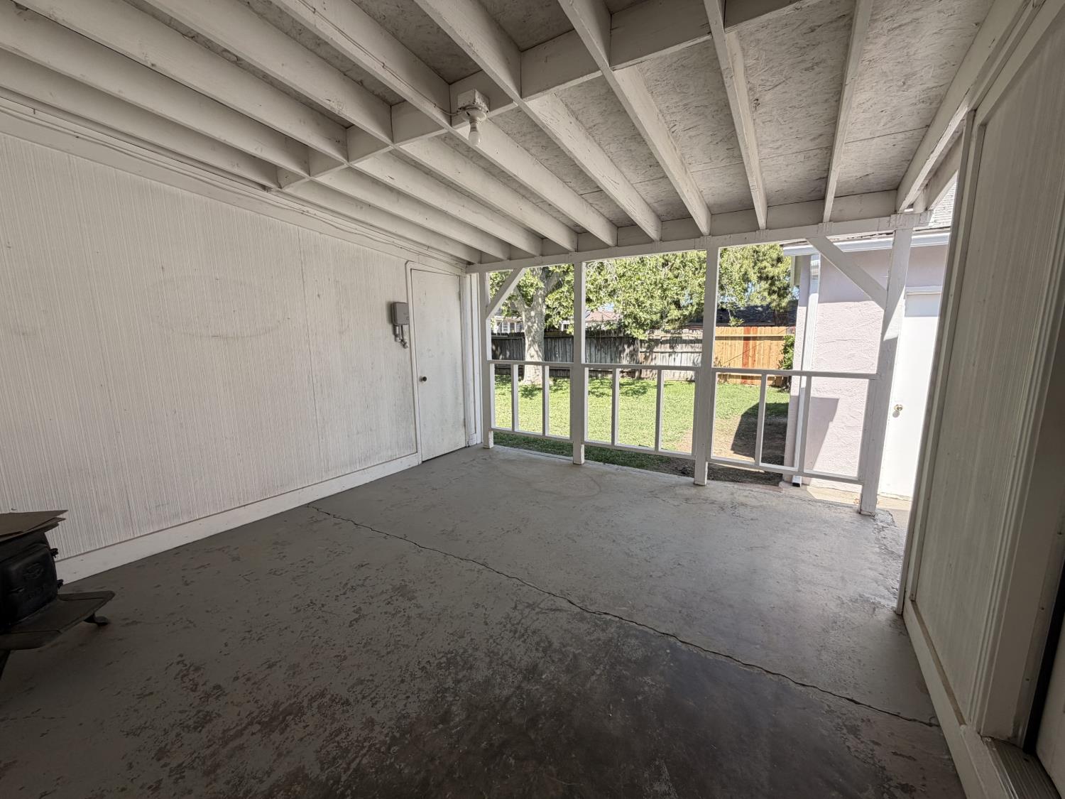 713 West 4th Street Madera, CA 93637 - Photo 20 of 28 a view of empty room with floor to ceiling window