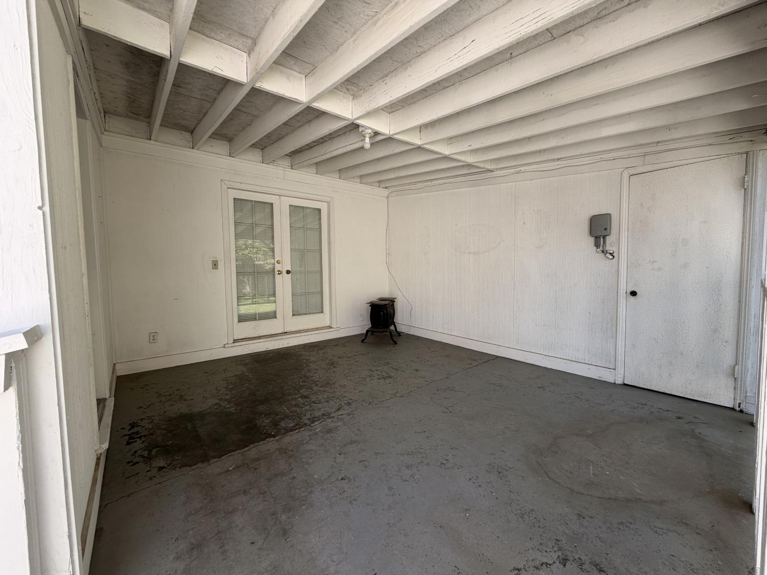 713 West 4th Street Madera, CA 93637 - Photo 21 of 28 a view of a livingroom with wooden floor and window
