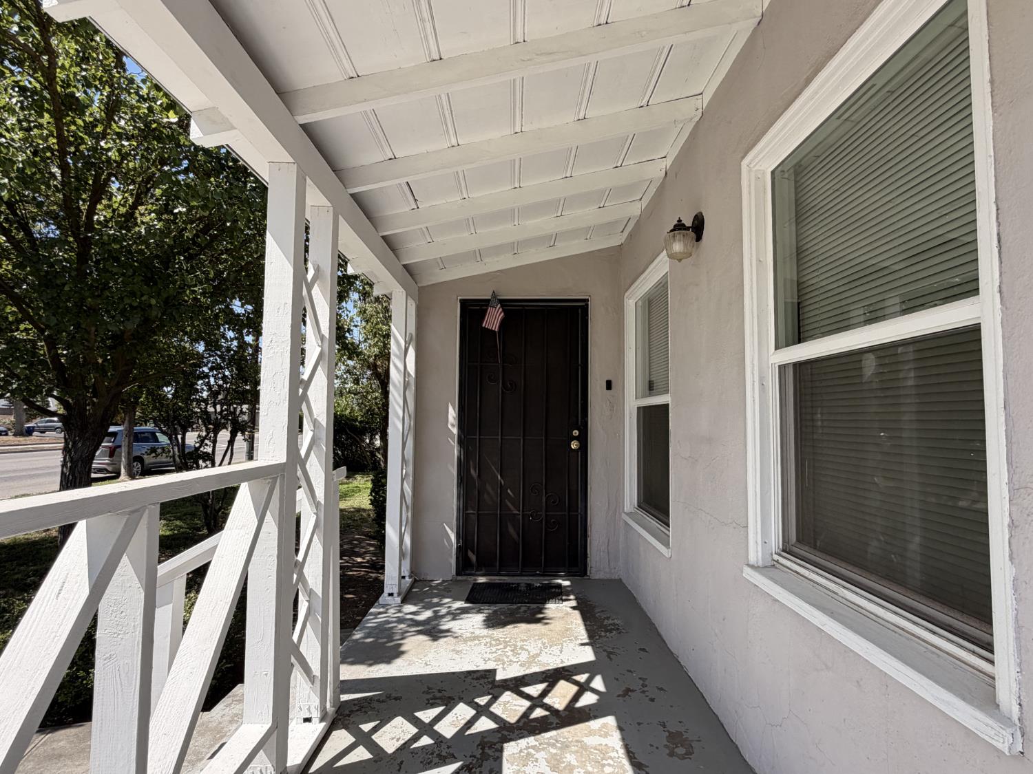 713 West 4th Street Madera, CA 93637 - Photo 6 of 28 a view of outdoor space with wooden floor and windows