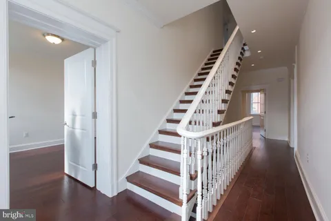 a view of entryway with wooden floor