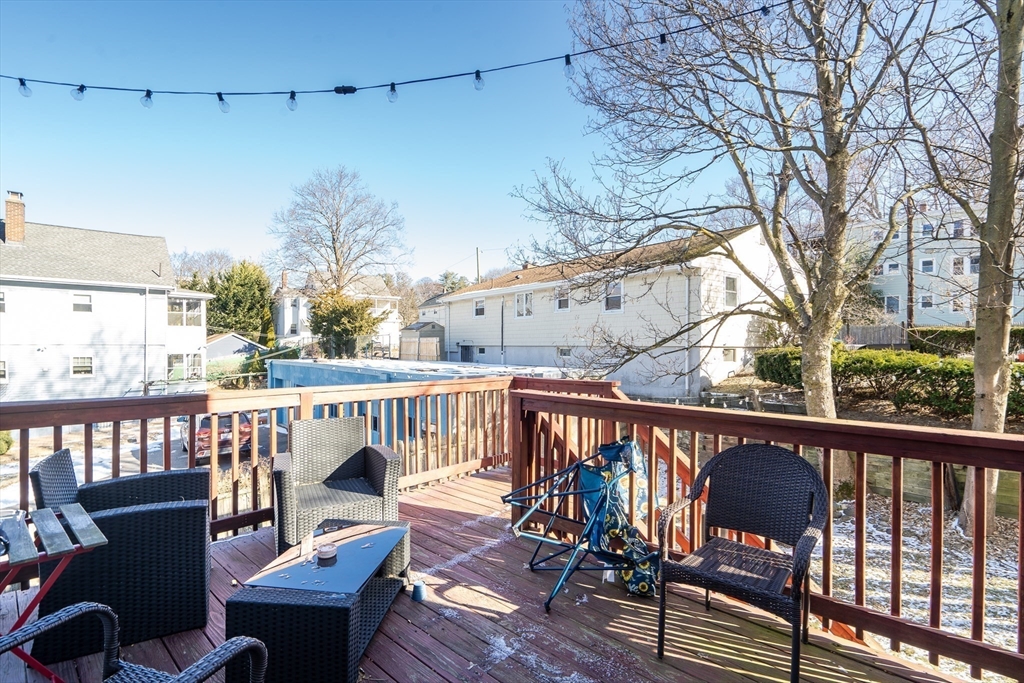 39 Union Street Boston, MA 02135 - Photo 25 of 27 a view of a balcony with furniture
