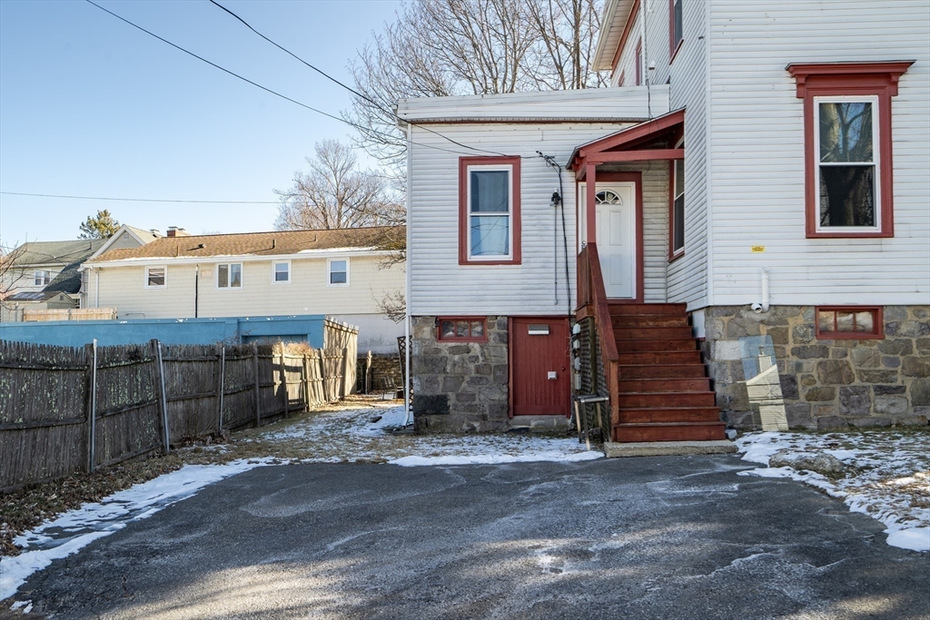 39 Union Street Boston, MA 02135 - Photo 26 of 27 a front view of a house with a yard