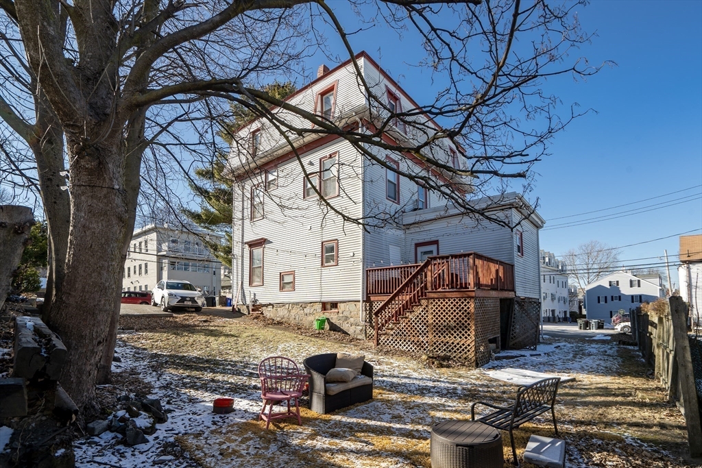 39 Union Street Boston, MA 02135 - Photo 27 of 27 a view of a house with large trees