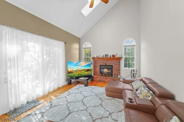 a bed room with furniture and a fireplace