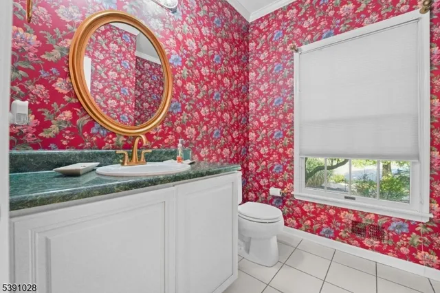 a bathroom with a toilet and a sink